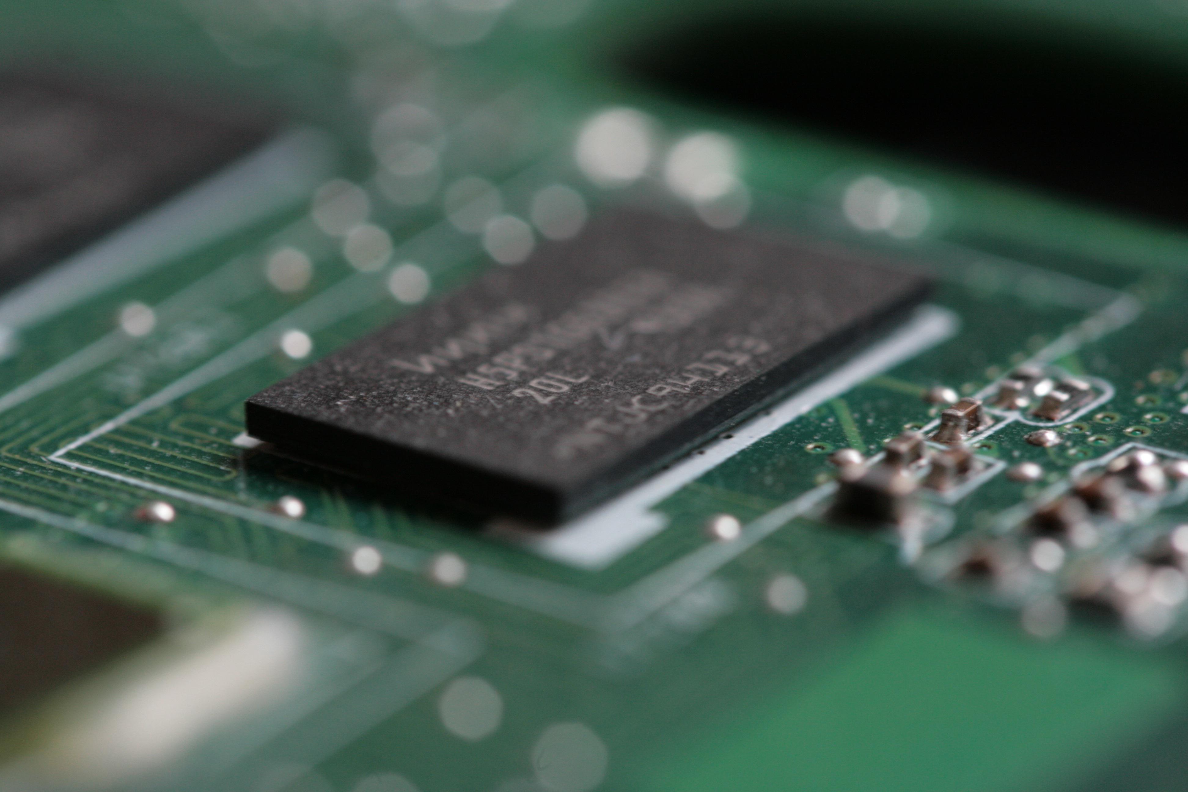Macro photograph of a semiconductor chip on a circuit board